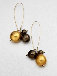 A lovely mix of gunmetal-finished and 18k goldplated spheres in a cluster design. Brass18k goldplated brassLength, about 2.75French wire backMade in USA 