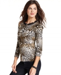 The henley tee gets a wild touch in Jones New York Signature's animal-print top. Lace trim at the neckline adds extra oomph! The henley tee gets a wild touch in Jones New York Signature's animal-print top. Lace trim at the neckline adds extra oomph!