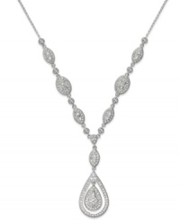 Victorian chic. Eliot Danori's detailed drop necklace showcases oval, teardrop and marquise-shaped links decorated with sparkling crystals and cubic zirconia (1/3 ct. t.w.). Set in rhodium-plated silver tone mixed metal. Approximate length: 16 inches + 2-inch extender. Approximate drop: 1-1/4 inches. Victorian chic. Eliot Danori's detailed drop necklace showcases oval, teardrop and marquise-shaped links decorated with sparkling crystals and cubic zirconia (1/3 ct. t.w.). Set in rhodium-plated silver tone mixed metal. Approximate length: 16 inches + 2-inch extender. Approximate drop: 1-1/4 inches.