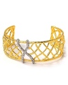Artfully glam, Alexis Bittar's woven cuff is your instant outfit refresher. Take your cues from the runways and wear this webby pick-up with a sequin-splashed mini and slick heels.