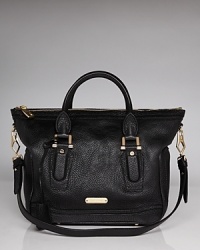 Versatility gets a hint of luxury from Burberry. This leather satchel is designed with top handles and a zip-top closure that makes it a perfect choice for chic days. Versatility gets a hint of luxury from Burberry. This leather satchel is designed with top handles and a zip-top closure that makes it a perfect choice for chic days.