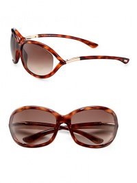 Rectangular frames in light-weight plastic with chic, semi-floating lens. Available in dark havana with brown gradient lens,. Metal accented temples100% UV protectionMade in Italy 