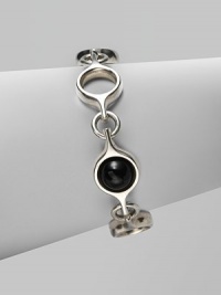 An unique and modern design featuring black agate spherical inset links and sterling silver circular links. Black agateSterling silverToggle closureLength, about 7½Imported An unique and modern design featuring black agate spherical inset links and sterling silver circular links. Black agateSterling silverToggle closureLength, about 7½Imported