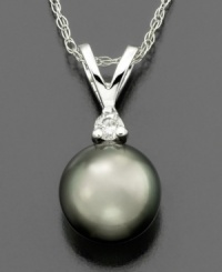 Experience worldly beauty with this intriguing pendant featuring Tahitian cultured pearl (8-9 mm) and round-cut diamond accents set in 14k white gold. Approximate length: 18 inches. Approximate drop: 1/2 inch. Experience worldly beauty with this intriguing pendant featuring Tahitian cultured pearl (8-9 mm) and round-cut diamond accents set in 14k white gold. Approximate length: 18 inches. Approximate drop: 1/2 inch.