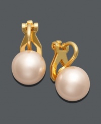 Pastel perfection. Charter Club's chic button earrings feature easy clip-on style with pink simulated plastic pearls (10 mm) in a gold tone mixed metal setting. Pastel perfection. Charter Club's chic button earrings feature easy clip-on style with pink simulated plastic pearls (10 mm) in a gold tone mixed metal setting.