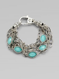 Stations of bright, faceted, crystal accented turquoise stone set in sterling silver on detailed link chains. Crystal accented turquoise doubletsSterling silverLength, about 7Lobster clasp closureImported Stations of bright, faceted, crystal accented turquoise stone set in sterling silver on detailed link chains. Crystal accented turquoise doubletsSterling silverLength, about 7Lobster clasp closureImported