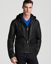 A leather bomber adds classic appeal and a definite edge to your everyday style from Michael Kors. Note the unique detachable hood detail for the designer's unique touch. A leather bomber adds classic appeal and a definite edge to your everyday style from Michael Kors. Note the unique detachable hood detail for the designer's unique touch.