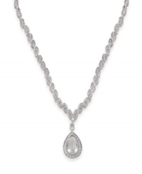 Look simply luminous in this glittering glass stone pendant by Carolee. Crafted in silver tone mixed metal. Approximate length: 16 inches + 2-inch extender. Approximate drop: 1-1/2 inches. Look simply luminous in this glittering glass stone pendant by Carolee. Crafted in silver tone mixed metal. Approximate length: 16 inches + 2-inch extender. Approximate drop: 1-1/2 inches.