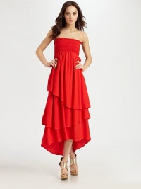 Vivacious strapless silhouette with a tiered hem can be folded over at the hips and worn as a maxi skirt. StraplessTiered hi-low hemAbout 26 from natural waistRayonDry cleanImportedModel shown is 5'10 (177cm) wearing US size Small. Vivacious strapless silhouette with a tiered hem can be folded over at the hips and worn as a maxi skirt. StraplessTiered hi-low hemAbout 26 from natural waistRayonDry cleanImportedModel shown is 5'10 (177cm) wearing US size Small.