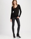 Back cutouts add a contemporary spin to this whisper-weight jersey must-have. ScoopneckLong sleevesBack cutoutsRayonDry cleanMade in USAModel shown is 5'9½ (176cm) wearing US size Small.