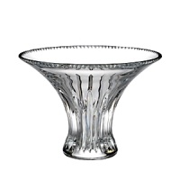 Elegant vertical cuts and intricate details at the lip of this traditional Waterford bouquet bowl reflect light with singular prismatic opulence. Elegant vertical cuts and intricate details at the lip of this traditional Waterford bouquet bowl reflect light with singular prismatic opulence.