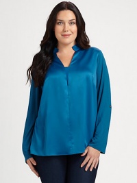 Smooth satin creates an impeccable backdrop for this flattering, relaxed style. Its classic French darts ensure it will have the fit you really want.Split mandarin collarLong sleevesFrench dartsAbout 27 from shoulder to hemPolyester/elastaneDry cleanImported