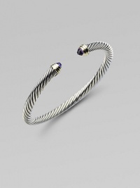 From the Cable Classic Collection. Sparkling violet amethysts and ringlets of 14k yellow gold elegantly placed at the ends of a signature cable design. Amethyst Sterling silver and 14k yellow gold Cable, 5mm Diameter, about 2½ Imported From the Cable Classic Collection. Sparkling violet amethysts and ringlets of 14k yellow gold elegantly placed at the ends of a signature cable design. Amethyst Sterling silver and 14k yellow gold Cable, 5mm Diameter, about 2½ Imported