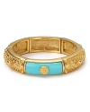 Exotic-jewels are big news this season, and T Tahari's stretch bracelet, featuring turquoise and gold plaques, is an easy way to nod to the trend. Slip it on to update your style.