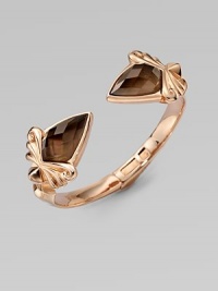 From the Superstud Collection. An arresting baroque design in sterling silver layered with glowing rose goldplating, capped with faceted triangles of smokey quartz quartz layered over white mother-of-pearl creating depth and drama.Smokey quartz and white mother-of-pearlRose goldplated sterling silverDiameter, about 2½HingedImported From the Superstud Collection. An arresting baroque design in sterling silver layered with glowing rose goldplating, capped with faceted triangles of smokey quartz quartz layered over white mother-of-pearl creating depth and drama.Smokey quartz and white mother-of-pearlRose goldplated sterling silverDiameter, about 2½HingedImported