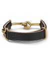 Get hooked on Giles & Brother leather and gold bracelet--it adds a rustic feel to your most frilly looks with ease.