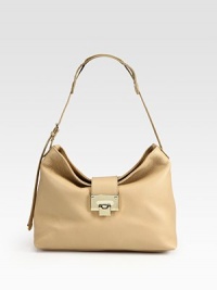 From the 24:7 Collection. A classic silhouette crafted in rich pebbled calf leather with a metal logo plaque. Adjustable shoulder strap, 8½-9¼ dropFlap clasp closureOne inside zip pocketSuede lining12½W X 8½H X 3½DMade in Italy From the 24:7 Collection. A classic silhouette crafted in rich pebbled calf leather with a metal logo plaque. Adjustable shoulder strap, 8½-9¼ dropFlap clasp closureOne inside zip pocketSuede lining12½W X 8½H X 3½DMade in Italy