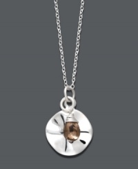 A subtle look that can be worn countless ways. This sweet, sterling silver pendant by Studio Silver features a shiny disc and a teardrop-shaped smokey quartz accent. Approximate length: 16 inches. Approximate drops: 1 inch and 3/4 inch. A subtle look that can be worn countless ways. This sweet, sterling silver pendant by Studio Silver features a shiny disc and a teardrop-shaped smokey quartz accent. Approximate length: 16 inches. Approximate drops: 1 inch and 3/4 inch.