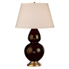 Chocolate glazed ceramic finish. Three way switch. Antique natural brass finished accents. Pearl Dupioni fabric shade.