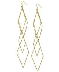 The perfect frame. Sleek, overlapping diamond shapes create an abstract pattern on GUESS's linear drop earrings. Crafted in shiny gold tone mixed metal. Approximate drop: 5-1/2 inches. The perfect frame. Sleek, overlapping diamond shapes create an abstract pattern on GUESS's linear drop earrings. Crafted in shiny gold tone mixed metal. Approximate drop: 5-1/2 inches.