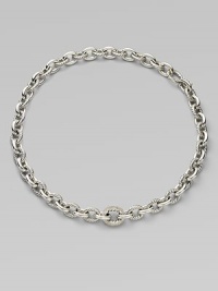 From the Chain Collection. A simply chic style featuring alternating smooth and cable links with a brilliant center link encrusted in diamonds. Sterling silverDiamonds, .81 tcwLength, about 17Push clasp closureImported 