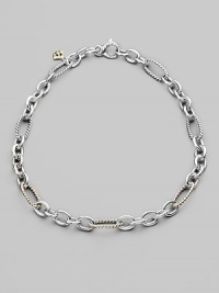 A stunning combination of cabled and smooth, oval and round links in sterling silver, with occasional links of 18k yellow gold. Sterling silver and 18k yellow gold Length, about 16 Lobster clasp Made in USA A stunning combination of cabled and smooth, oval and round links in sterling silver, with occasional links of 18k yellow gold. Sterling silver and 18k yellow gold Length, about 16 Lobster clasp Made in USA