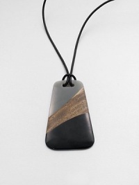 A leather cord and stunning, art-deco inspired pendant made from a brilliant combination of wood and resin.Leather cordLength, about 23Pendant size, about 4Pull-stringImported A leather cord and stunning, art-deco inspired pendant made from a brilliant combination of wood and resin.Leather cordLength, about 23Pendant size, about 4Pull-stringImported
