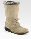 Water-resistant sport suede braves the elements and is enhanced with a faux fur lining for warmth.Shaft, 9Front tie detailFaux fur liningPadded insoleRubber soleMade in SpainAdditional InformationShipping timeline for this item Women's Shoe Size Guide (International Equivalents) This item cannot be shipped via Rush, Next Business Day, Saturday delivery.This item cannot be shipped to a P.O. Box, APO/FPO or U.S. Territory. 