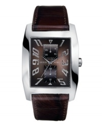 A croc-embossed leather strap lends classic style to this GUESS watch. A croc-embossed leather strap lends classic style to this GUESS watch.