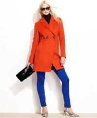 Refined lines punctuated by two bold buttons create the look of a menswear blazer, retooled with a feminine fit from Vince Camuto. Refined lines punctuated by two bold buttons create the look of a menswear blazer, retooled with a feminine fit from Vince Camuto.