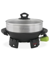 Ready to wok! This nonstick aluminum wok with adjustable temperature dial and extra-large stainless steel steamer revolutionize the way you cook. Promoting healthier, nutrient-rich meals, this wok is a professional chef when it comes to stir-frying, browning and sauteing. 1-year warranty. Model WO400852. Ready to wok! This nonstick aluminum wok with adjustable temperature dial and extra-large stainless steel steamer revolutionize the way you cook. Promoting healthier, nutrient-rich meals, this wok is a professional chef when it comes to stir-frying, browning and sauteing. 1-year warranty. Model WO400852.