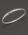 From the Silver collection, a basic hammered bangle in sterling silver. Designed by Ippolita.