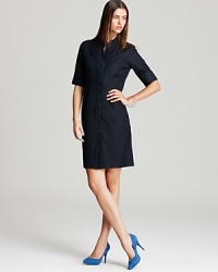 Slip on T Tahari's Avona dress, an effortless option in classic chambray and a cool, collarless silhouette. Slip on T Tahari's Avona dress, an effortless option in classic chambray and a cool, collarless silhouette.