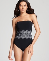 An exquisite Chantilly lace, laser-cut overlay defines the style-and waistline-of this ultra-chic Gottex design. An exquisite Chantilly lace, laser-cut overlay defines the style-and waistline-of this ultra-chic Gottex design.