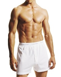 Classic universal fitting knit boxer shorts with buttonfly opening. Clean design for ease of movement. Logo waistband. Classic universal fitting knit boxer shorts with buttonfly opening. Clean design for ease of movement. Logo waistband.