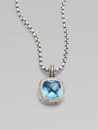 From the Albion Collection. A beautiful faceted blue topaz center stone surrounded by dazzling diamonds. Diamonds, .3 tcw Blue topaz Sterling silver Size, about ½L X ½ W Imported Please note: Chain sold separately. 