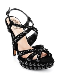 These tall strappy VINCE CAMUTO sandals are ready to come out and play on your next evening out. Basic black sparkles studded with oversized accents. These tall strappy VINCE CAMUTO sandals are ready to come out and play on your next evening out. Basic black sparkles studded with oversized accents.