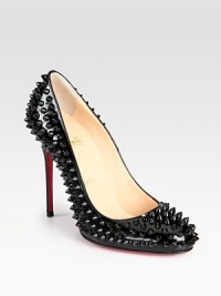 Intensify your look wearing this patent leather silhouette covered with fierce lacquered spikes. Self-covered heel, 4 (100mm)Patent leather upper with lacquered spikesLeather liningSignature red leather solePadded insoleMade in Italy Intensify your look wearing this patent leather silhouette covered with fierce lacquered spikes. Self-covered heel, 4 (100mm)Patent leather upper with lacquered spikesLeather liningSignature red leather solePadded insoleMade in Italy