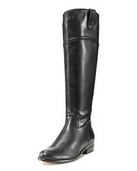 Lean leather boots with pared-down equestrian details add sleek styling--minus the stables--to fall's ladylike looks. By Corso Como. Lean leather boots with pared-down equestrian details add sleek styling--minus the stables--to fall's ladylike looks. By Corso Como.