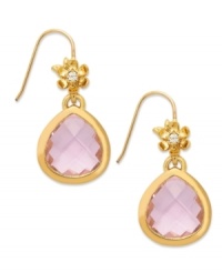 A bouquet beauty. These teardrop earrings from Juicy Couture captivate with floral accents embellished with clear glass stones, sitting atop a faceted pink-hued glass teardrop. Crafted in 14k gold-plated mixed metal. Approximate drop: 1-1/4 inches. A bouquet beauty. These teardrop earrings from Juicy Couture captivate with floral accents embellished with clear glass stones, sitting atop a faceted pink-hued glass teardrop. Crafted in 14k gold-plated mixed metal. Approximate drop: 1-1/4 inches.