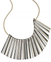 Setting a tone, three times over. INC International Concepts goes for the bold with this bib necklace, crafted from gold-, silver- and hematite-tone mixed metal. Approximate length: 18 inches + 3-inch extender.