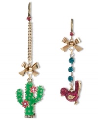Get lost in the desert. Betsey Johnson's linear earrings feature a mismatched design with an sharp-looking cactus and a colorful bird. Crafted from gold tone mixed metal with sparkling crystal accents, crystal cup chain and gold tone bows. Approximate drop (cactus): 3-1/4 inches. Approximate drop (bird): 2-3/8 inches.