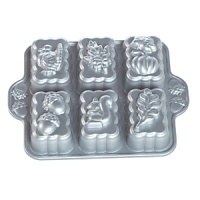 Perfect for autumn, this pan let's you accent cute mini-loaves with sweet fall designs. Perfect for autumn, this pan let's you accent cute mini-loaves with sweet fall designs.