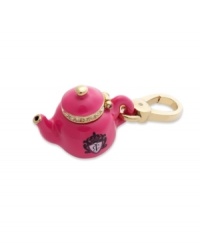 Tip it over and the style comes out! This cute pink epoxy teapot charm is embellished with clear stone accents and logo detail. Crafted in gold tone brass. Finished with a lobster clasp closure. Chain not included. Approximate length: 1-3/4 inches. Tip it over and the style comes out! This cute pink epoxy teapot charm is embellished with clear stone accents and logo detail. Crafted in gold tone brass. Finished with a lobster clasp closure. Chain not included. Approximate length: 1-3/4 inches.