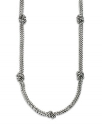 A classic necklace by Lauren by Ralph Lauren featuring two silvertone mixed metal rope chains with knots interspersed. Approximate length: 36 inches. A classic necklace by Lauren by Ralph Lauren featuring two silvertone mixed metal rope chains with knots interspersed. Approximate length: 36 inches.