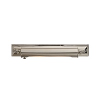 By reflecting light off its nickel construction, the classically minimalist design of this Ralph Lauren sconce infuses small and large spaces with a cool, effusive glow.