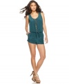 Fringe details add a modern-frontier flair to this BCBGMAXAZRIA romper -- pair it with hot-hued heels for a summer soiree look!