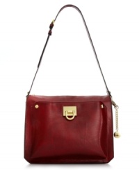 This classic wear-with-anything silhouette from Ivanka Trump is dressed in a posh lizard-embossed pattern and high-shine hardware. Adjustable strap and intuitively organized interior make it the perfect complement to your workday or weekend wardrobe. This classic wear-with-anything silhouette from Ivanka Trump is dressed in a posh lizard-embossed pattern and high-shine hardware. Adjustable strap and intuitively organized interior make it the perfect complement to your workday or weekend wardrobe.