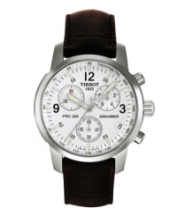 Handsome styling and chronograph function make Tissot's PRC 200 a dress watch built for performance. Brown leather croc-embossed strap and round stainless steel case. White chronograph dial features tachymeter scale at outer rim, numerals at twelve, three and nine o'clock, date window at four o'clock, luminous stick indices and hands, three subdials and logo. Swiss movement. Water resistant to 200 meters. Two-year limited warranty. Handsome styling and chronograph function make Tissot's PRC 200 a dress watch built for performance. Brown leather croc-embossed strap and round stainless steel case. White chronograph dial features tachymeter scale at outer rim, numerals at twelve, three and nine o'clock, date window at four o'clock, luminous stick indices and hands, three subdials and logo. Swiss movement. Water resistant to 200 meters. Two-year limited warranty.