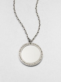 A simply chic circular pendant accented with sparkling rhinestones on a link chain. Glass stonesIon-plated brass and steelLength, about 16Pendant size, about .66 Lobster clasp closureImported 